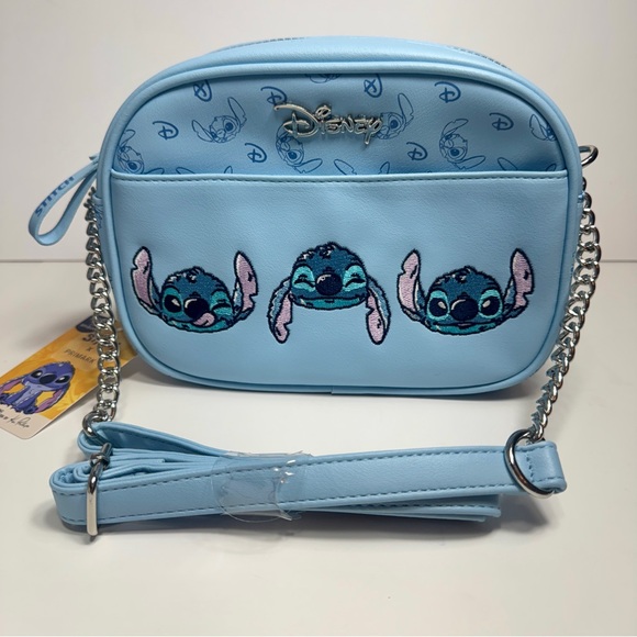 Disney Handbags - NWT. Primark Disney’s Stitch Camera crossbody Bags Light blue camera bag